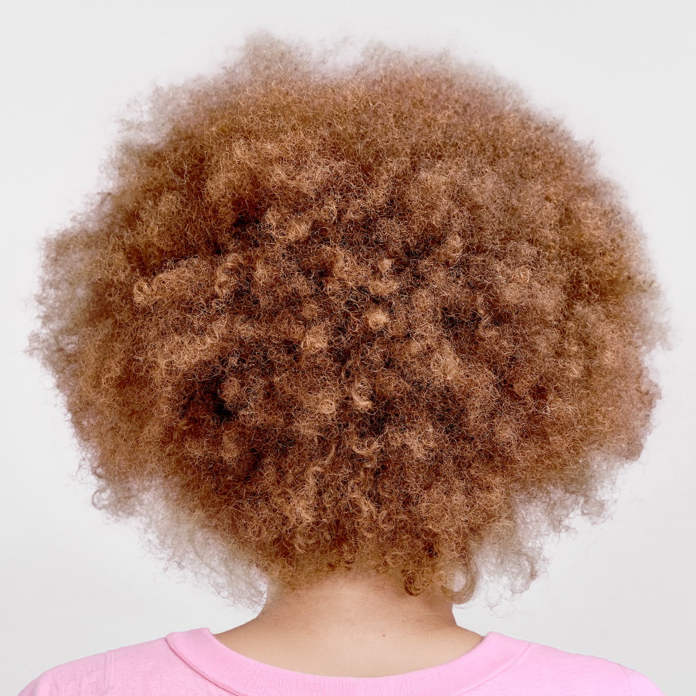 Cheveux boucl&eacute;s &agrave; cr&eacute;pus
